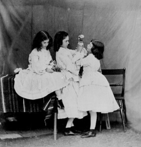 Edith, Lorina, and Alice Liddell in "Open Your Mouth and Shut your Eyes" (1860)
